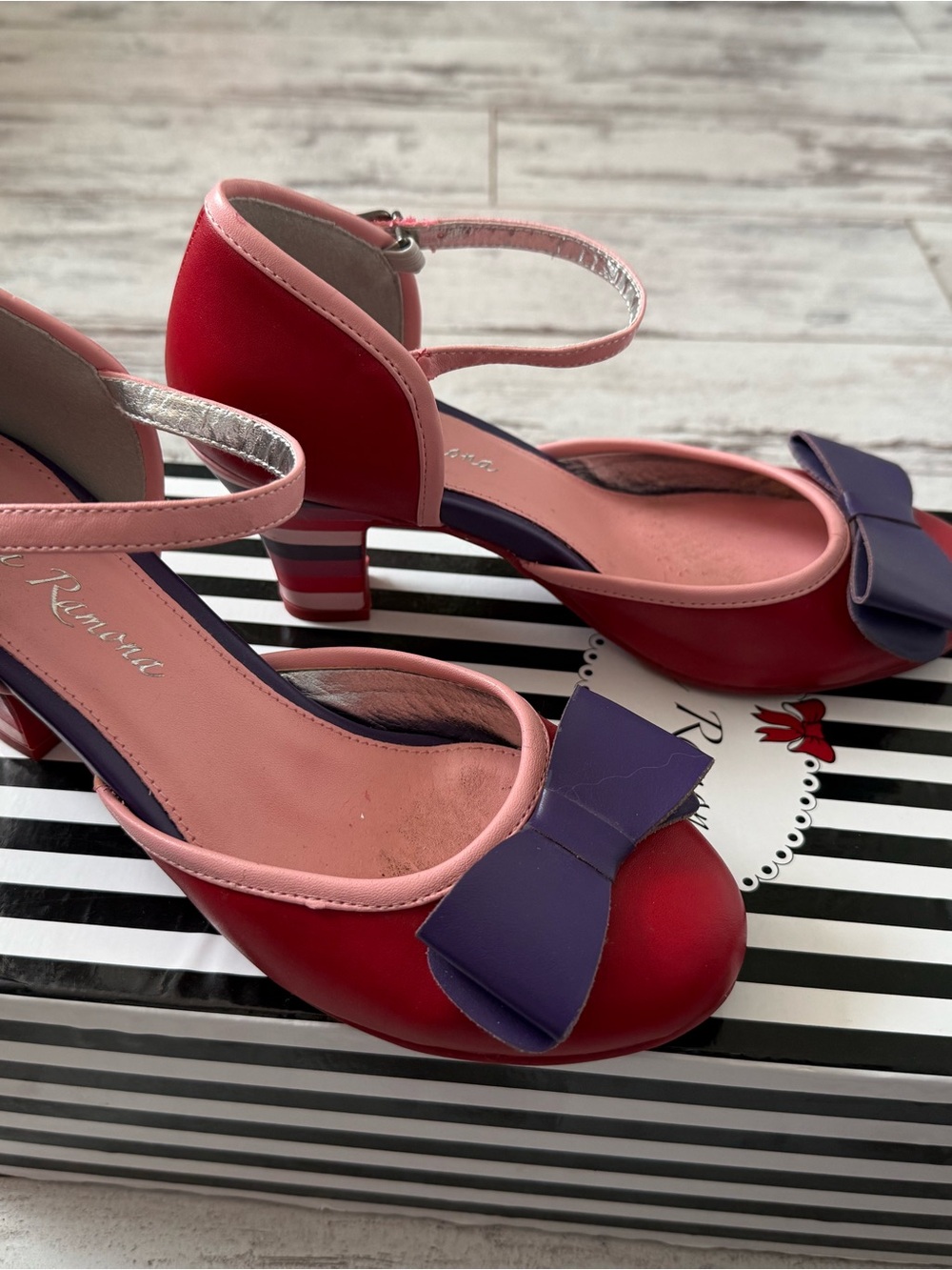Women's Red Heels with Pink Trim and Purple Bow